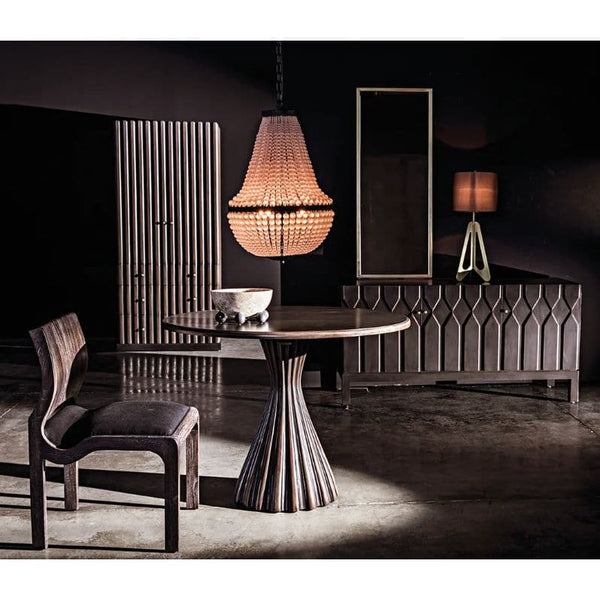 Osiris Round Black & Mahogany Dining Table with contemporary design and fluted base.