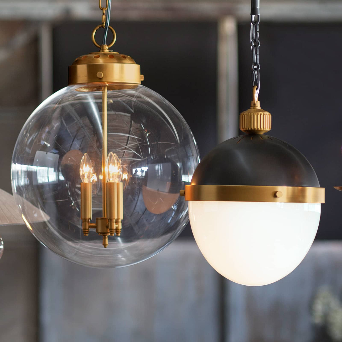 Otis Pendant Medium Blackened Natural Brass with white milk glass globe.