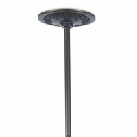 Otis Pendant's blackened natural brass ceiling canopy and suspension rod.