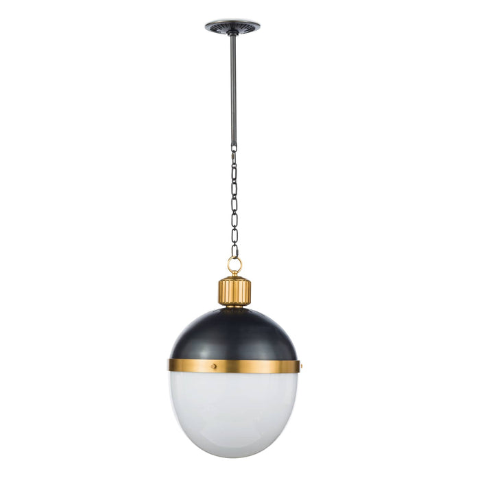 Otis Medium Blackened Natural Brass Pendant with a bold black metal dome and translucent white milk glass globe.