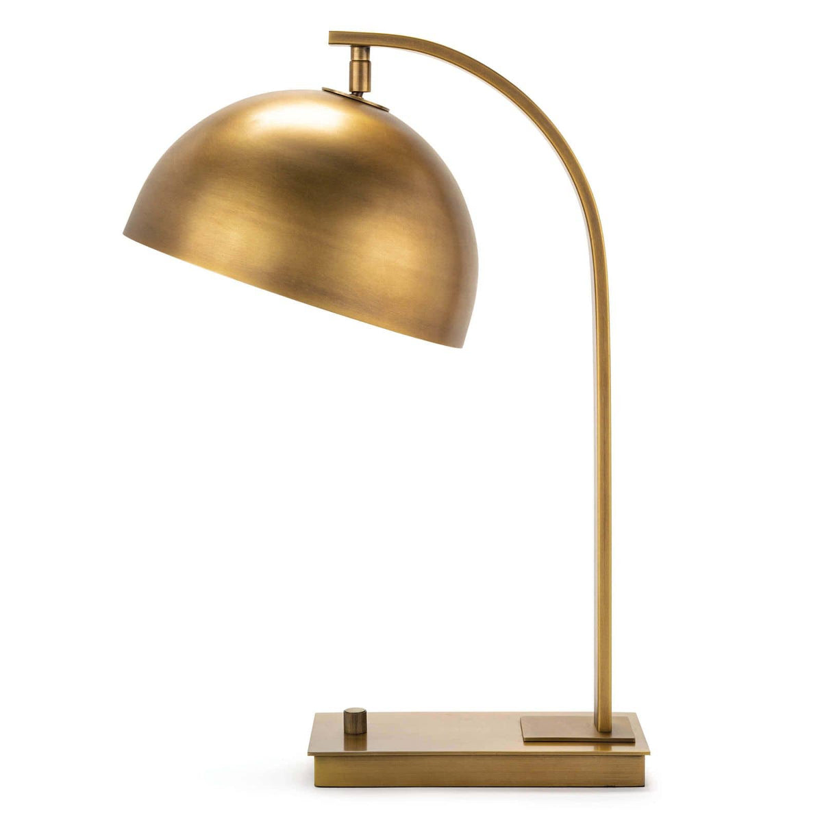 Otto desk lamp with a natural brass finish, adjustable metal dome shade, curved neck, and simple base.