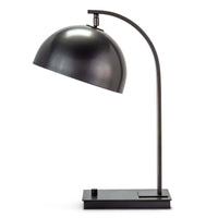 Otto desk lamp in oil rubbed bronze with a curved neck and adjustable metal dome shade.