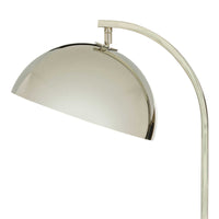 Otto floor lamp with a sleek, arching neck and a swiveling, polished metal dome shade.