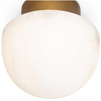 Parker Alabaster Flush Mount light with a natural brass canopy and a glowing white alabaster globe.