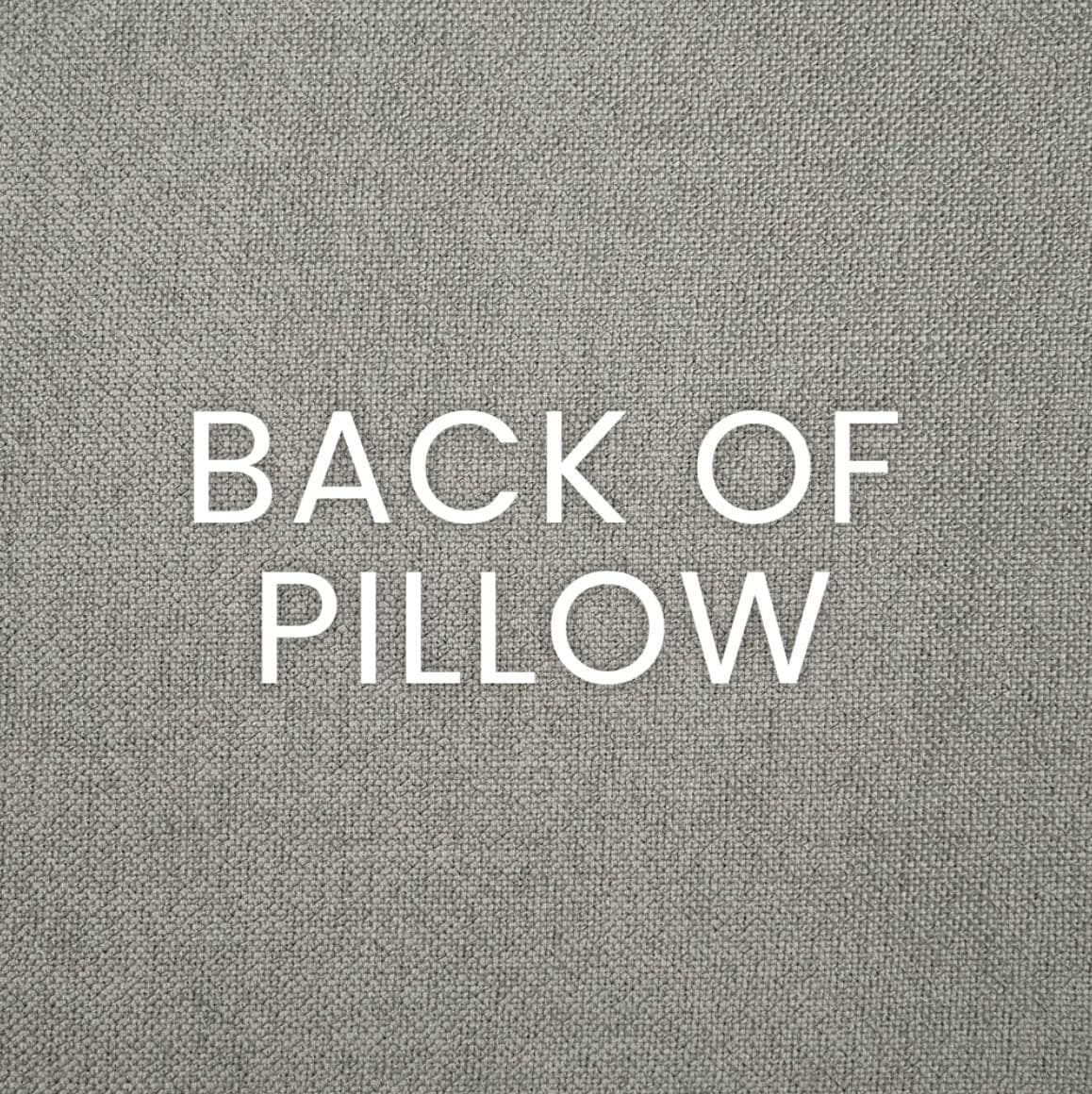 Text "BACK OF PILLOW" on a textured gray polyester fabric.