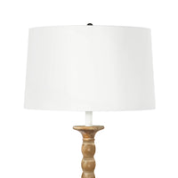 Perennial Floor Lamp with a natural rustic wood base, white linen shade, and functional tabletop.