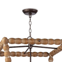 Perennial Lantern Natural, a rustic chic hand-lathed solid wood chandelier with faux drip wax details.