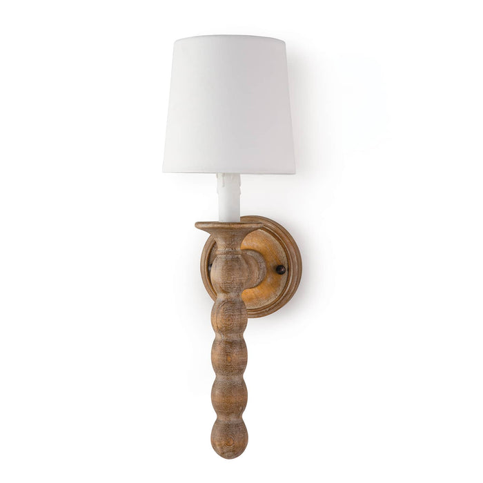 Natural wood Perennial Sconce with a rustic chic finish, white linen shade, and faux drip wax candle sleeve.