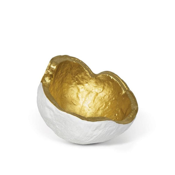 White and gold textured metal bowl with a lustrous gold interior and rough white exterior.