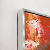 Close-up of "Play It Right" giclee canvas painting with brush gel finish, featuring vibrant red, orange, and white abstract strokes in a silver floating frame.