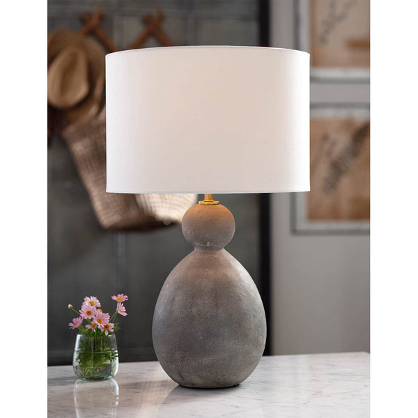 Playa Ceramic Table Lamp with a large, textured gray ceramic body and a crisp white linen drum shade.
