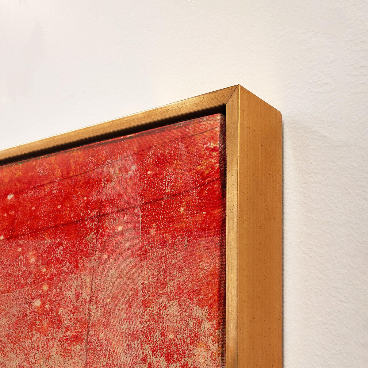 Abstract red giclee canvas painting with a knife gel finish and a gold floating frame.