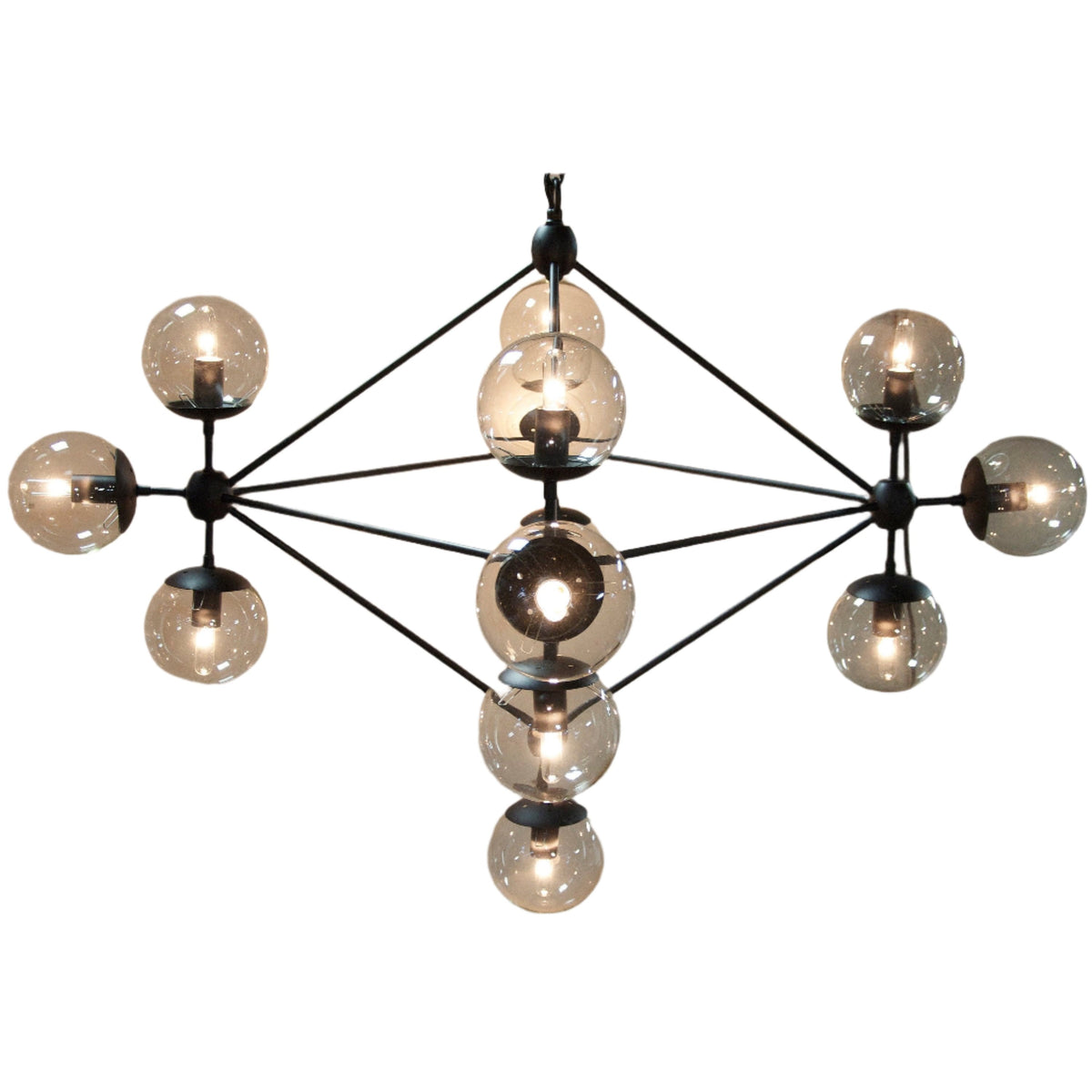 Pluto celestial-inspired black chandelier with multiple round glass bulbs orbiting a diamond metal structure.