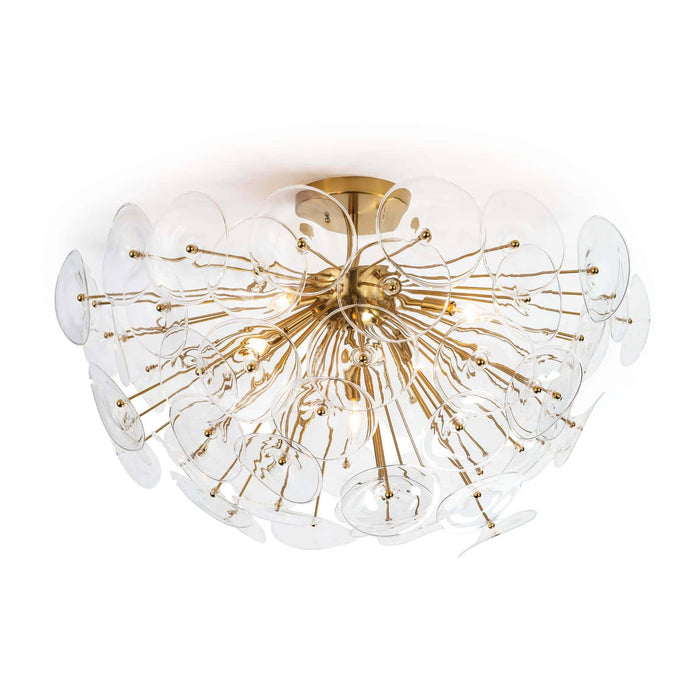 Poppy semi-flush mount light with clear undulating glass discs and natural brass rods.