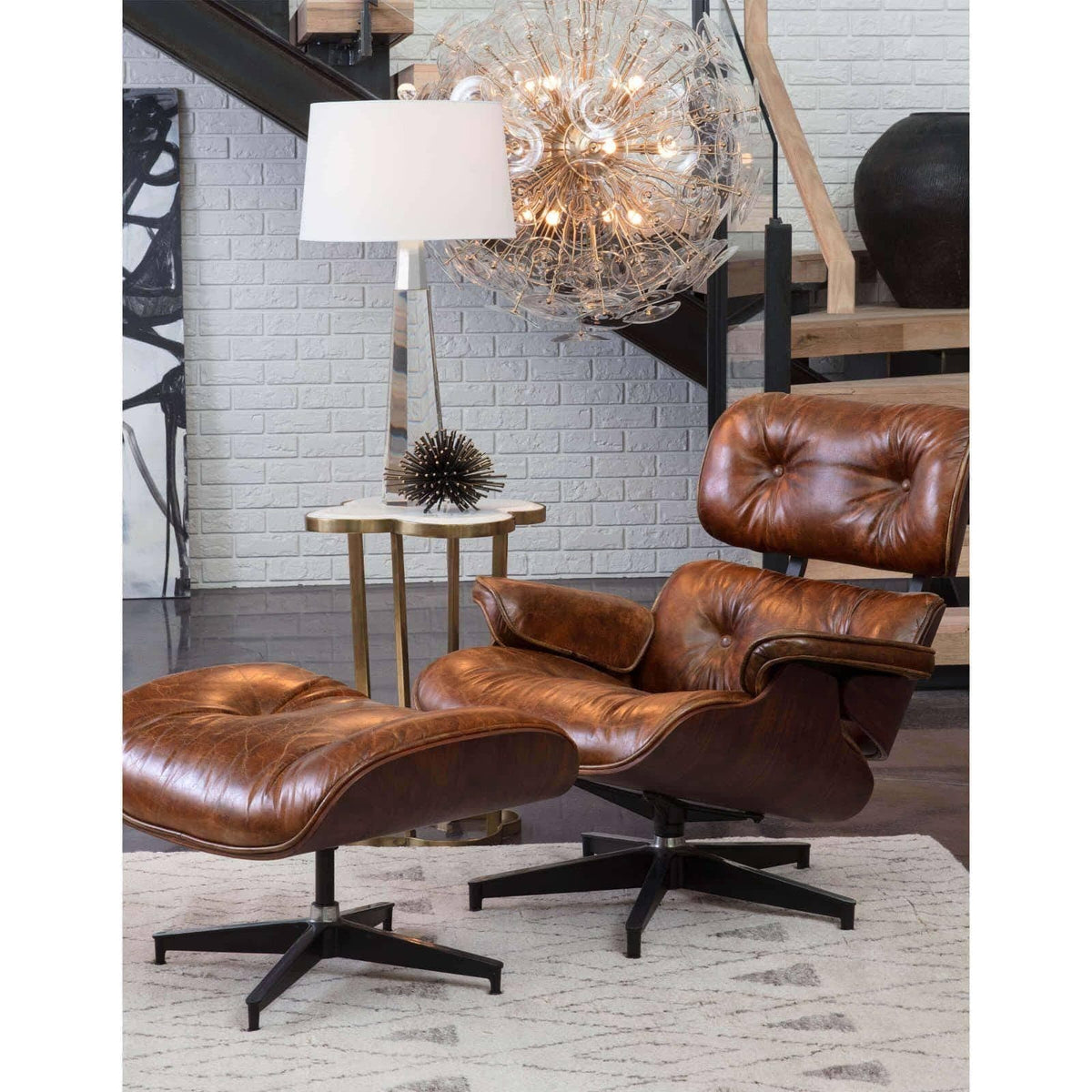 Poppy large glass and brass sputnik chandelier with clear undulating discs, illuminating a modern living space.