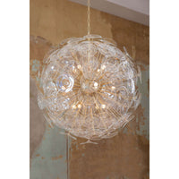 Poppy large glass and brass sputnik chandelier with undulating clear glass discs.
