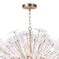 Poppy large glass and brass chandelier with undulating clear glass discs and natural brass rods.