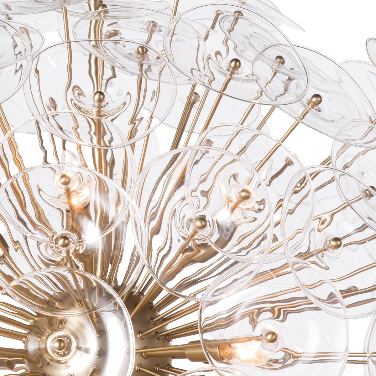 Poppy Large Chandelier with clear undulating glass discs and natural brass rods in a sputnik-style design.