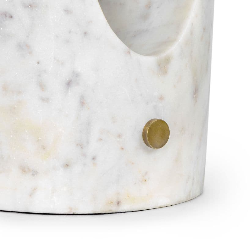 Close-up of Portia Marble Table Lamp base, showing natural white marble with lavender veining and a brass switch.