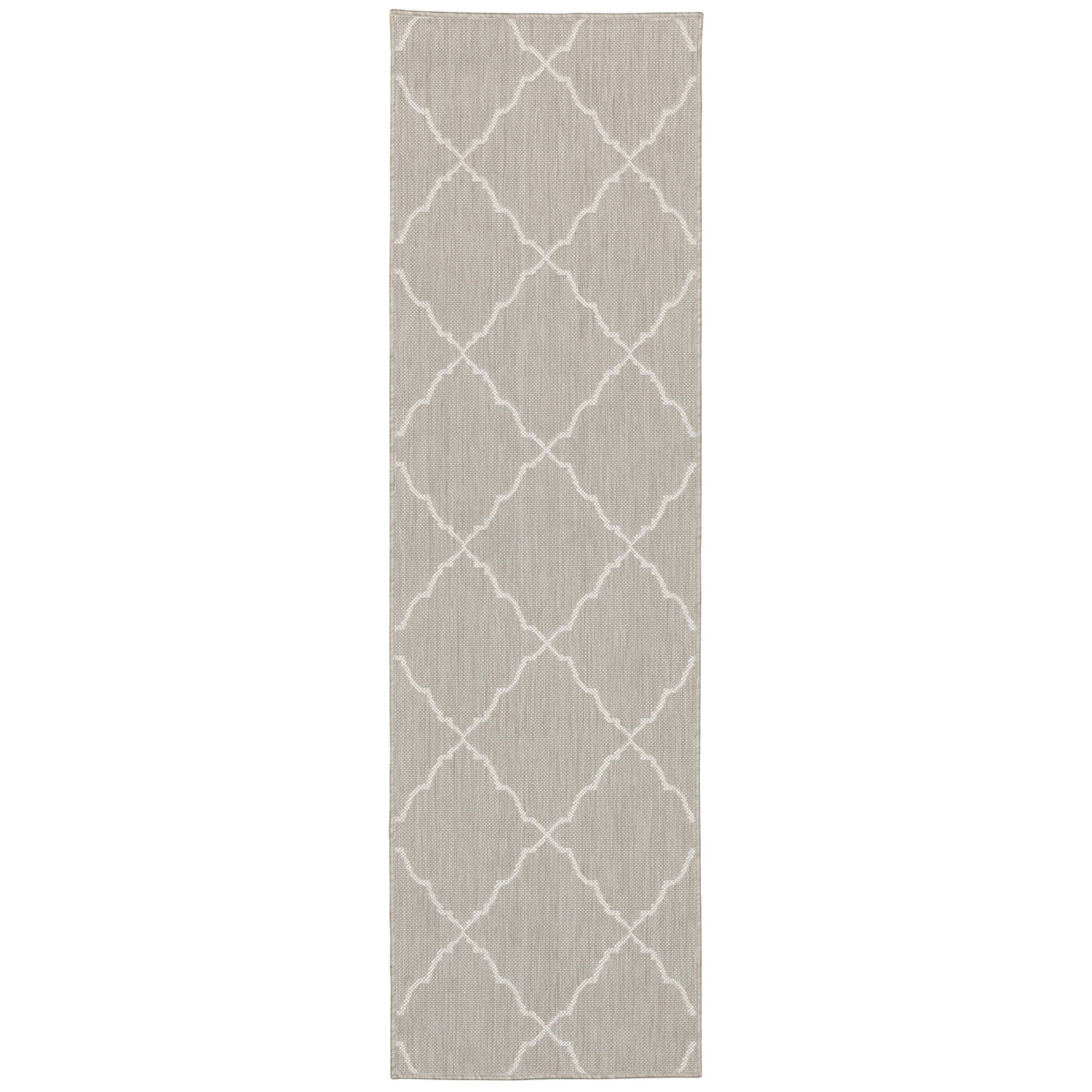 Portofino Grey flatwoven polypropylene outdoor rug with a white Moroccan trellis pattern.