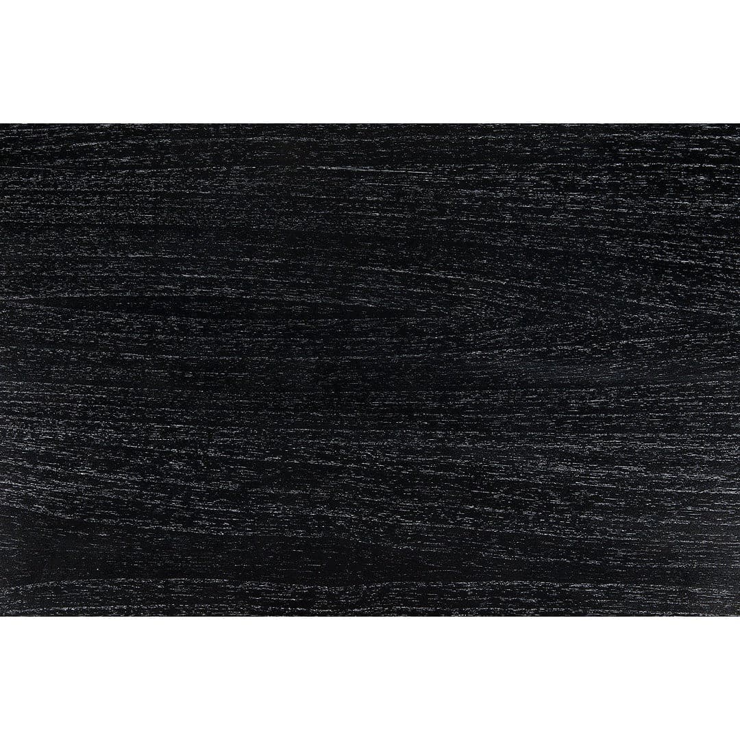 Close-up of a Portuguese desk's hand-rubbed black solid mahogany surface, showing wood grain.