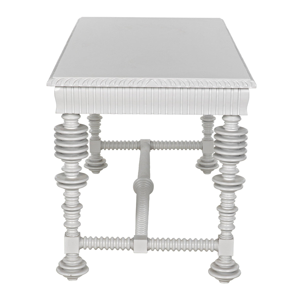 White mahogany office desk with spool-turned legs and carved apron.