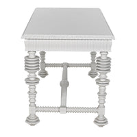 White mahogany office desk with spool-turned legs and carved apron.