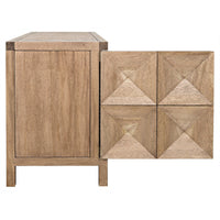 Washed walnut sideboard with three geometrically carved doors, one open revealing interior storage.