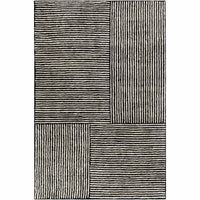 Black & ivory hand-tufted viscose rug with horizontal and vertical striped blocks.