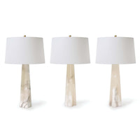 Three Quatrefoil Alabaster Table Lamps with tapered alabaster bases and white linen drum shades.
