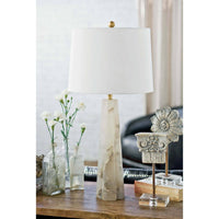 Small Quatrefoil Alabaster Table Lamp with a tapered translucent base, white linen drum shade, and brass accents.