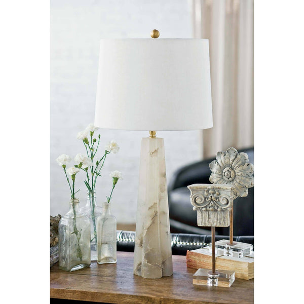 Small Quatrefoil Alabaster Table Lamp with a tapered translucent base, white linen drum shade, and brass accents.