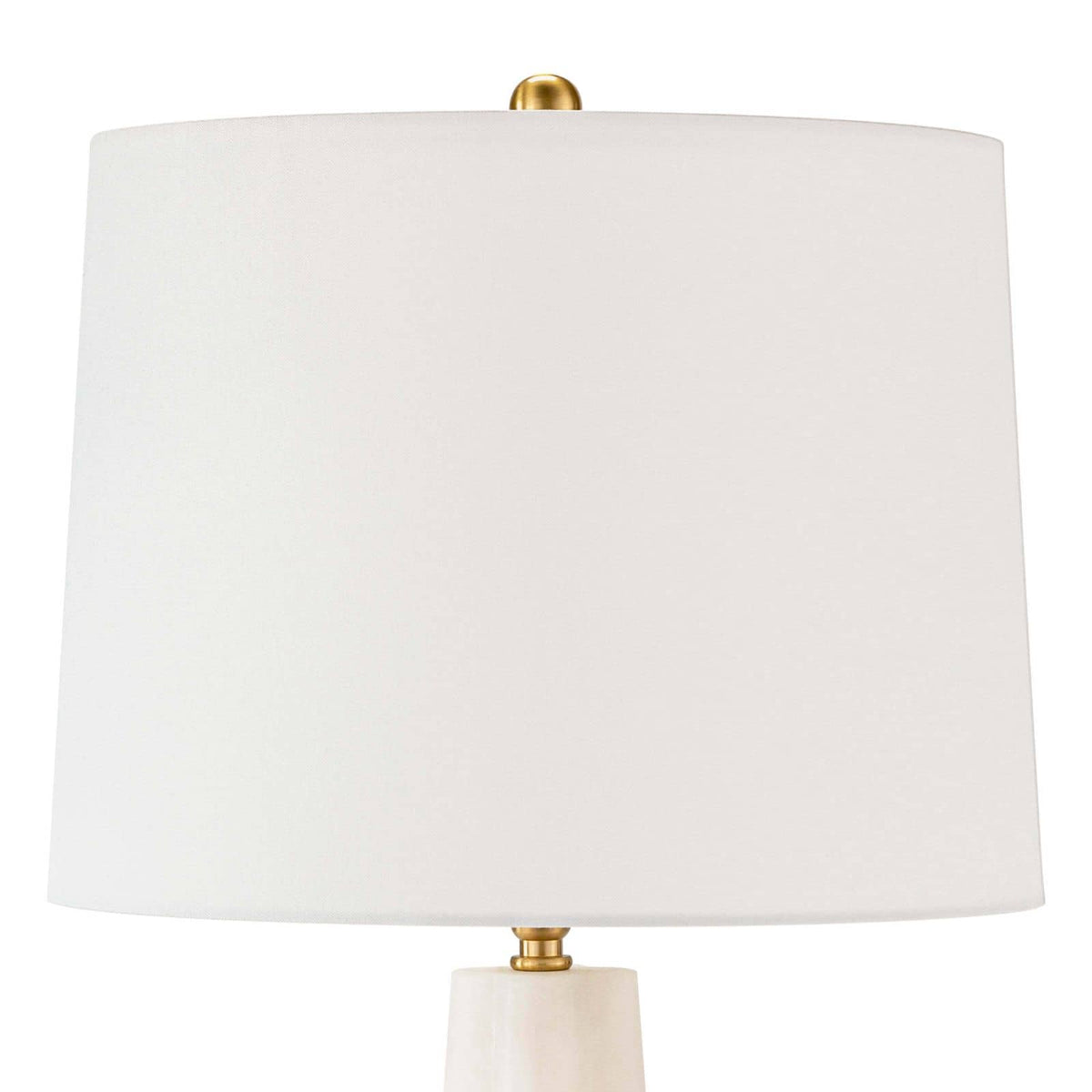 Small Quatrefoil Alabaster Table Lamp with a tapered alabaster base and a white linen drum shade.