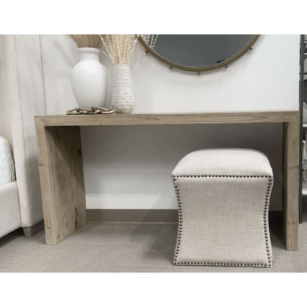 Raymond Gray Pine Console Table, a rustic rectangular reclaimed wood table with a light gray finish.