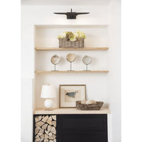 Redford Small Picture Light in Oil Rubbed Bronze above a white niche with shelves and decor.