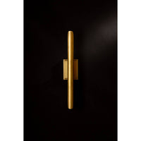 Redford Sconce in natural brass, a classic modern steel wall light with a vertical tubular design.