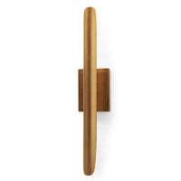 Redford Sconce in natural brass, a vertical, slender, modern steel wall light.