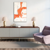 Reef II Giclee Canvas Painting, a vertical abstract artwork with orange and white brushstrokes, displayed above a console table.