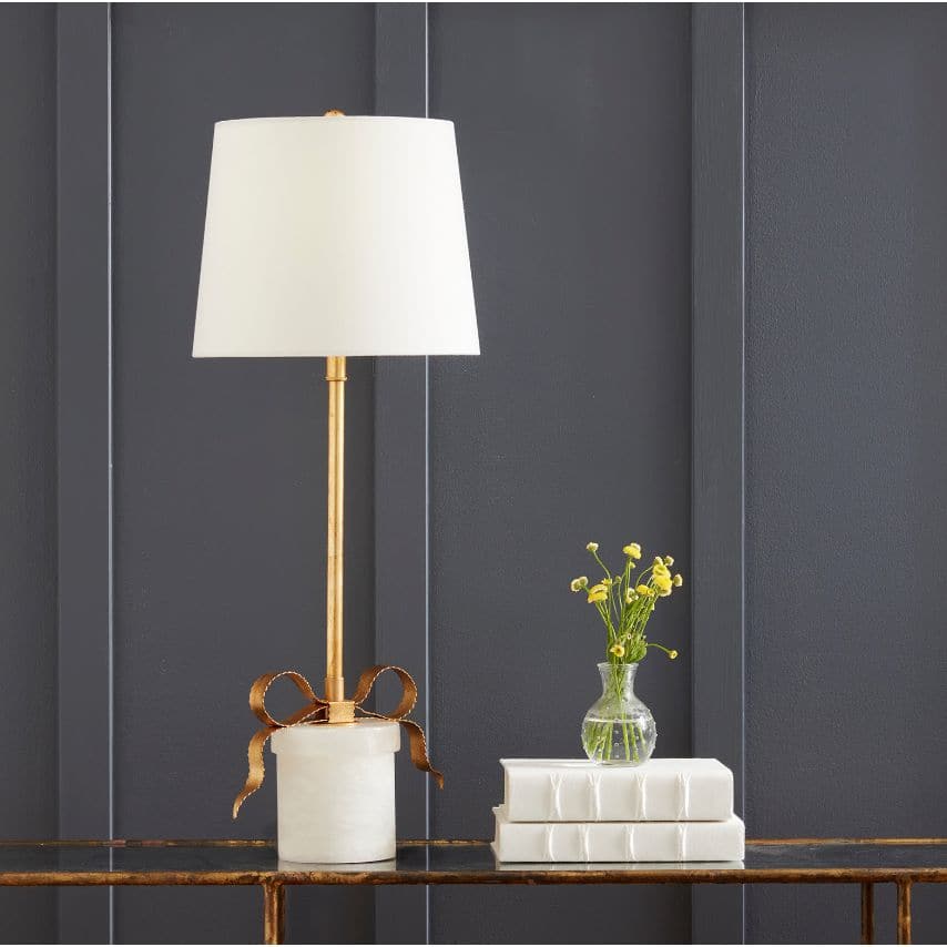 Elegant gold-leafed Ribbon Table Lamp with a white linen shade and alabaster gift-box base.