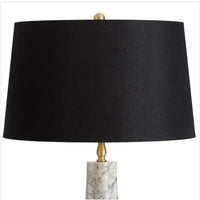 Roman White Carrara marble table lamp with a black linen shade and natural brass finial.