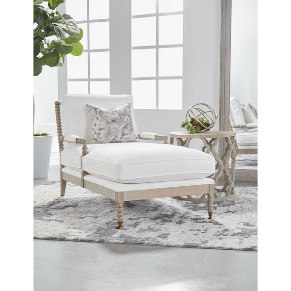 White Rouleau Peyton Pearl Chaise Lounge with carved spool solid wood frame and patterned throw pillow.