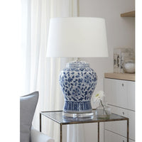 Royal Ceramic Table Lamp with blue floral design, white linen shade, and crystal base.