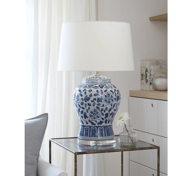 Royal Ceramic Table Lamp with blue floral design, white linen shade, and crystal base.