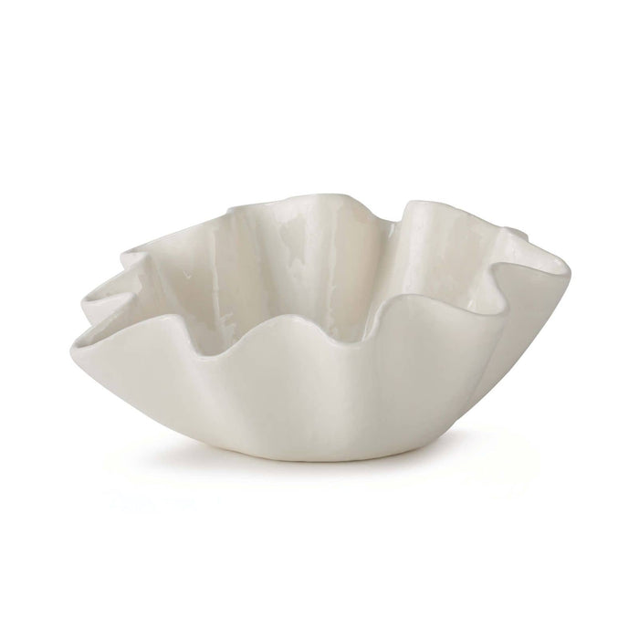 Medium creamy white ceramic bowl with ruffled edges.