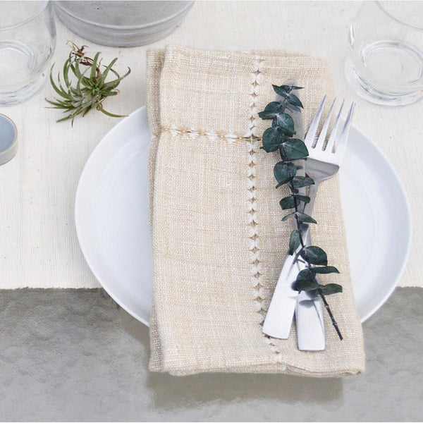 Napkin with decorative elements on a table setting