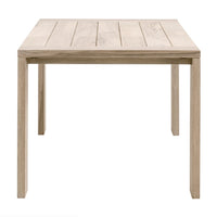 Santini Gray Teak Outdoor Dining Table, a rectangular solid teak wood table with slatted top and sturdy legs.