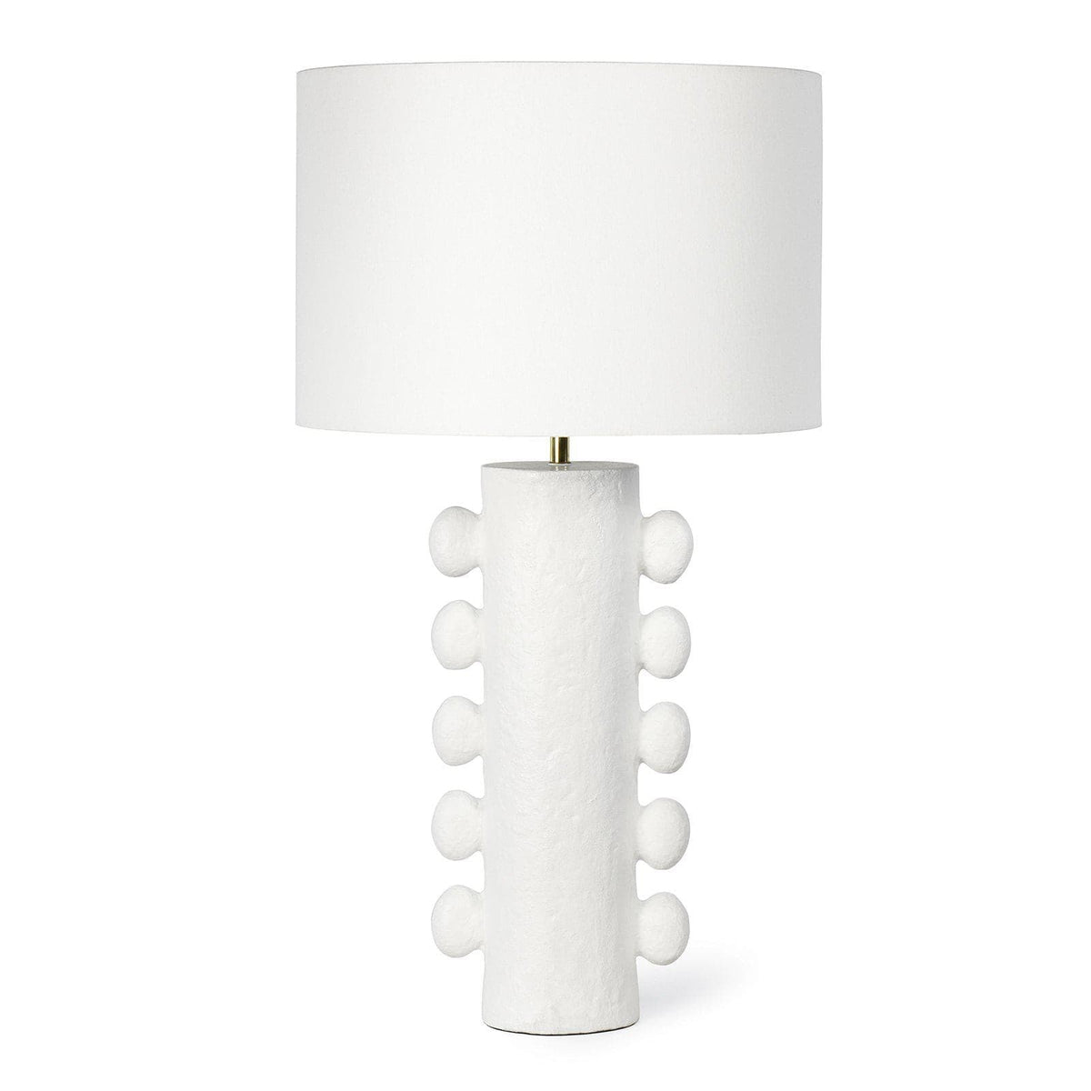 White Sanya Metal Table Lamp with a textured, sculptural base and a matching linen drum shade.
