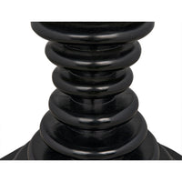 Schilling Side Table's sculptural black base with concentric rings and hand-rubbed finish.