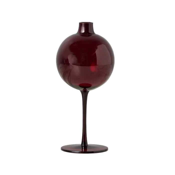 Dark red glass vase on a white background