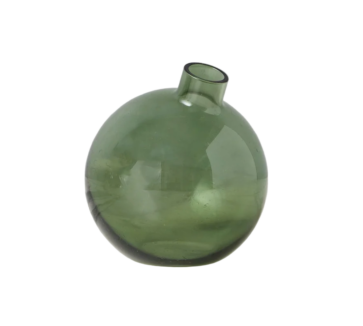 Green glass bud vase on a white surface with a white background